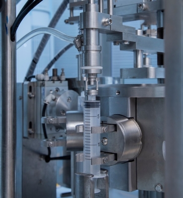 0.5-80ml क्षमता पूर्व भरा हुआ सिरिंज भरने की मशीन Siemens PLC Control System एक नोजल